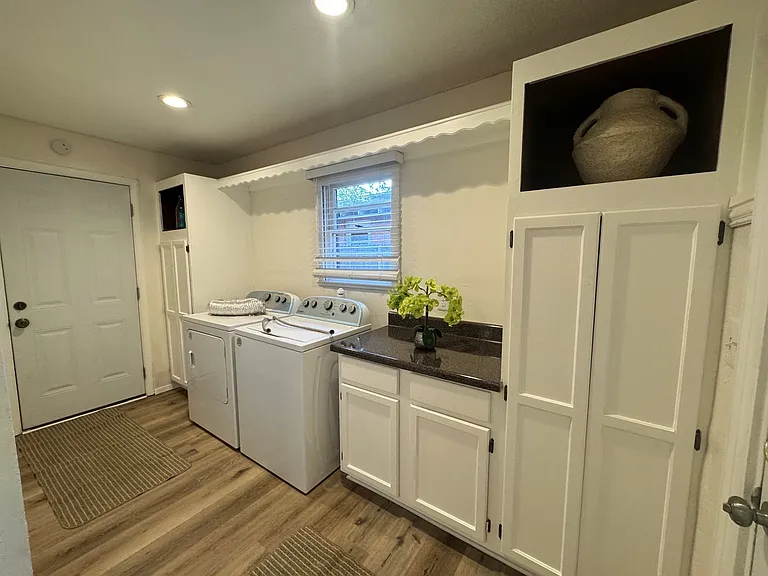 Mud Room/Utility has washer, dryer & storage