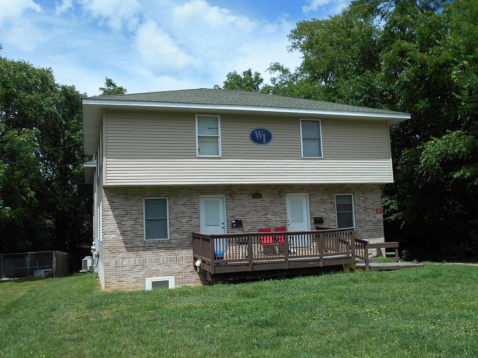 Front of building, apartment is the door to the right