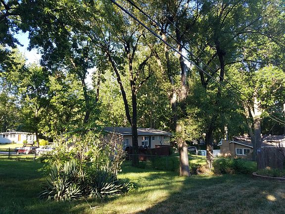 view of this home from the backyard, fenced shady yard!!!