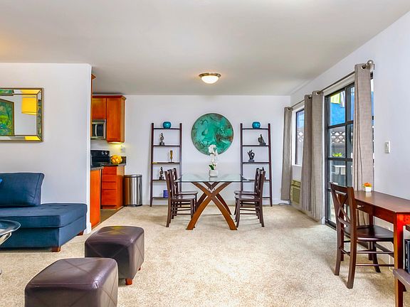 Living Room leads into Dining Room