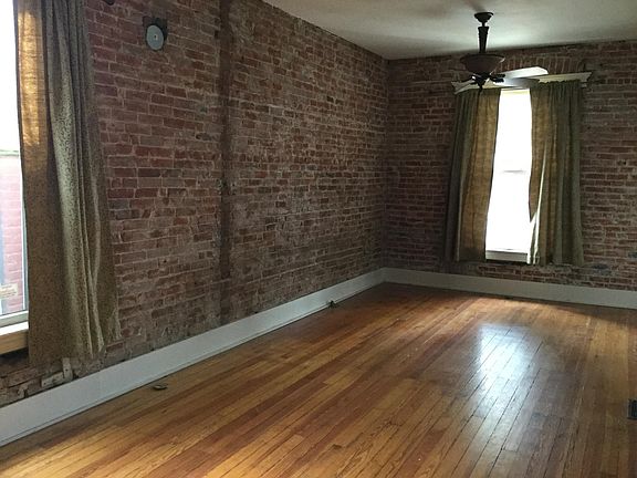 Living room with exposed brick
