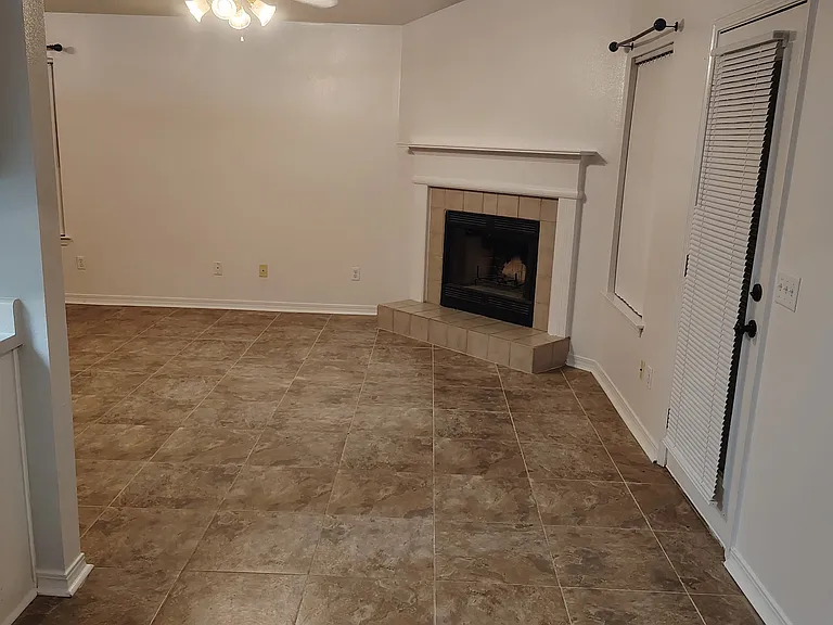 Living / Family Room (taken from Dining Area). Door on right is to backyard.