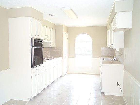 Kitchen wth pantry.