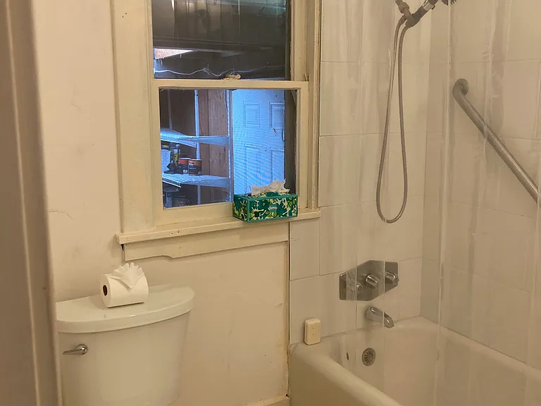 Bathroom with tub and shower