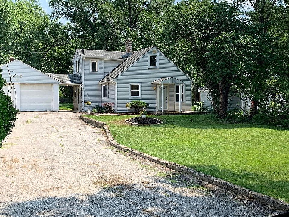 House is set far back from road.