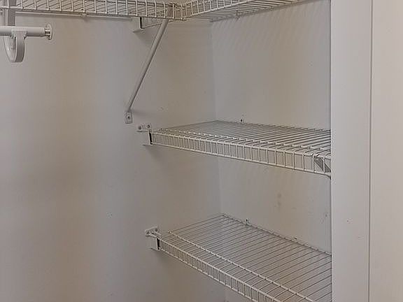 Walk in closet in main bedro