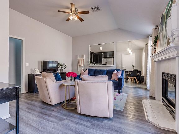 Open living room with gas fireplace