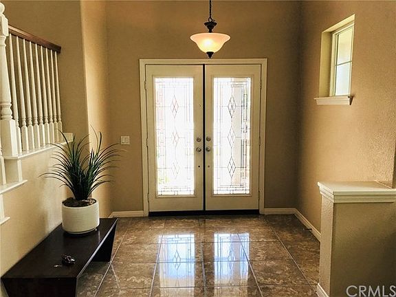 Beautiful Leaded Glass Double Door Entry with Foyer.