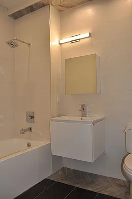 Rented by At Home Realty NY LLC | media 11