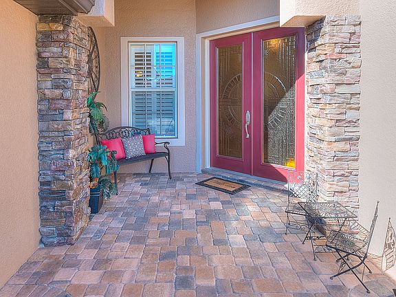 Stacked stone & glass doors.