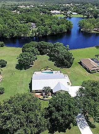 Aerial View. Over 1 acre lakefront
