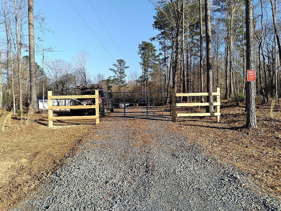 Front gate and fence at driveway
