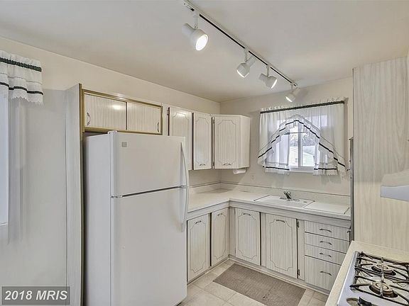 Gas cooktop, new refrigerator and wall oven