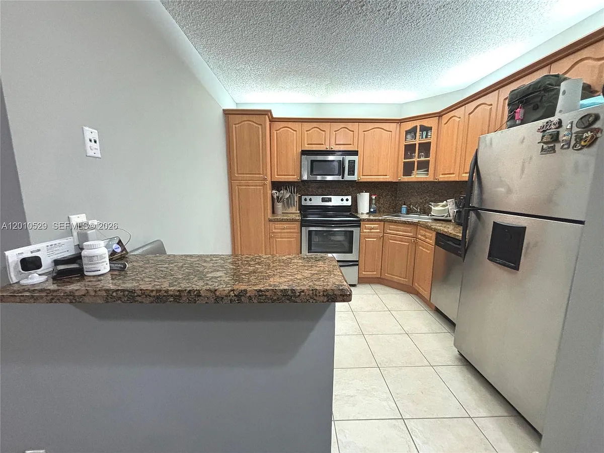 Building Photo - 3859 Coral Tree Cir #308
