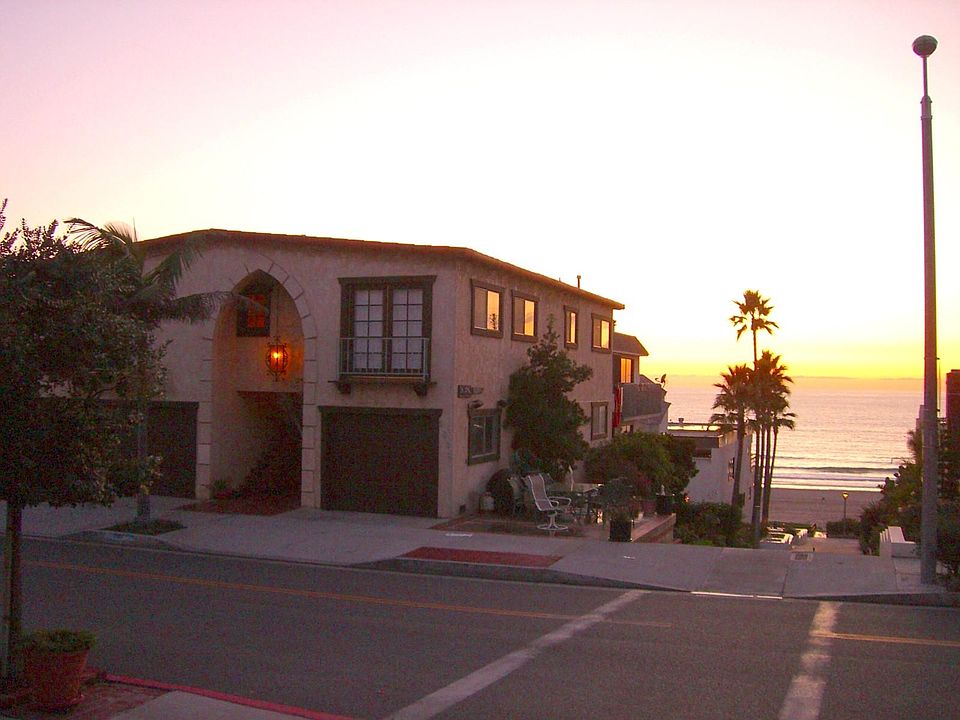 Our building at dusk. So nice to be on the patio and watch the sunsets!