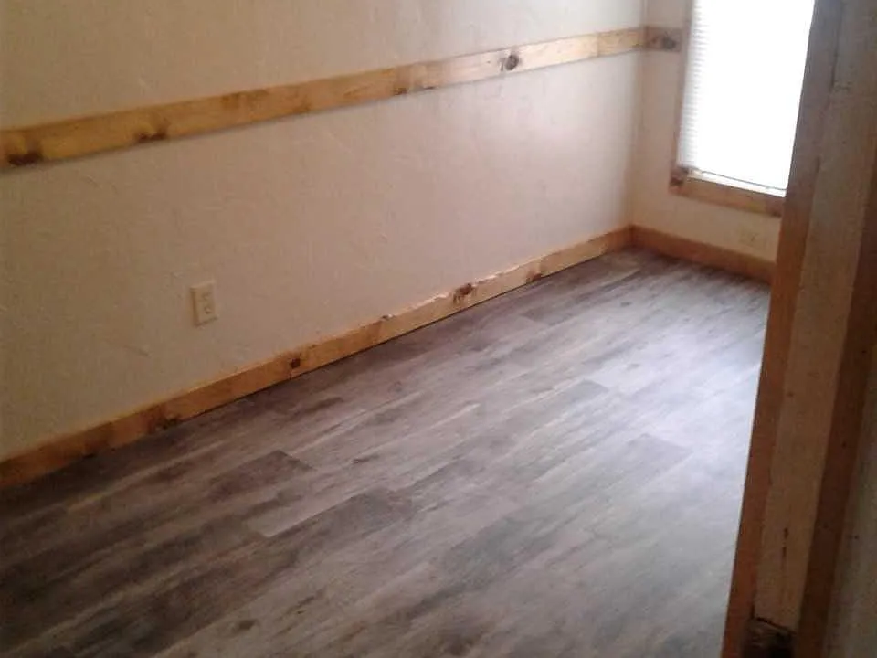 Bedroom view, note, just remodeled and has nice closet to left. Vinyl plank floors. Ceiling fan above!