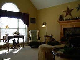 Large family room with stone fireplace