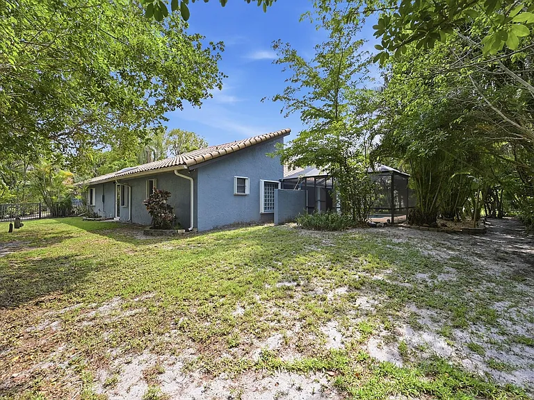9033 NW 47th Ct — Photo 59