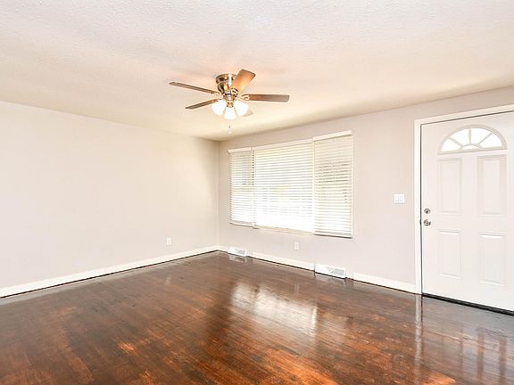Looking from the eat in kitchen into the living room.