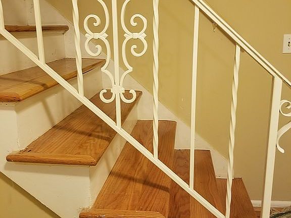 Stairs leading to 4 bedroom/fullbath