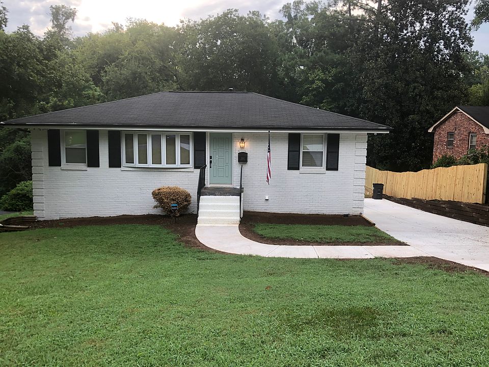 With new Driveway & Fence