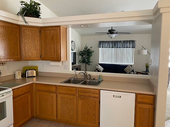 Spacious Kitchen. Equipped with small appliances, flatware, dinnerware, glassware, cookware, bakeware, large toaster oven, keurig and drip coffee maker etc.