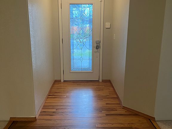 Hard wood front entry door.