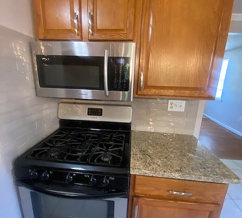 kitchen gas stove and micorwave