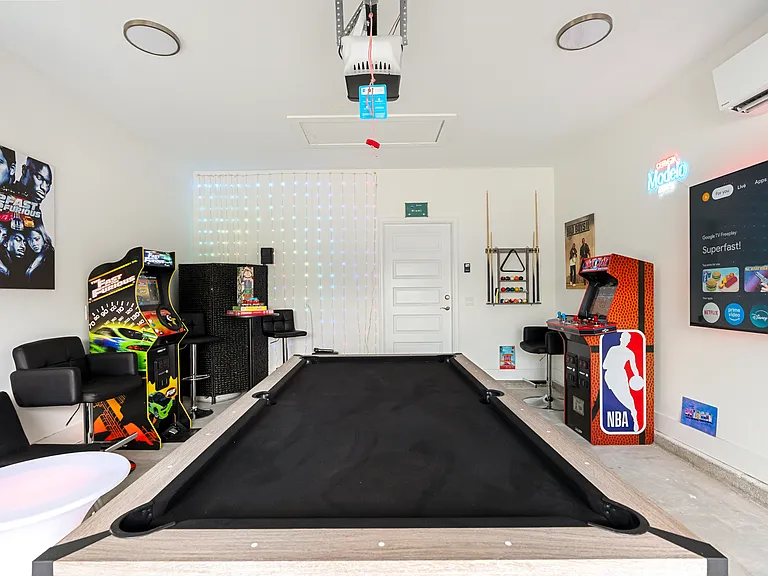 Gameroom with A/C & Heat, Pool Table, Samsung Smart LED TV 65 inch, & Arcade games