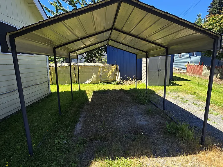 Carport behind home