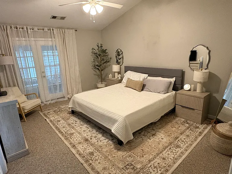 Serene primary suite designed with comfort and simplicity in mind, featuring soft neutral finishes, generous natural light, and a peaceful retreat atmosphere.