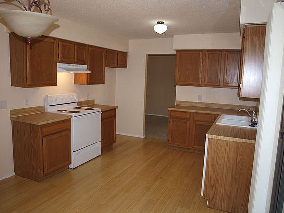 New wood flooring in the eat in kitchen.