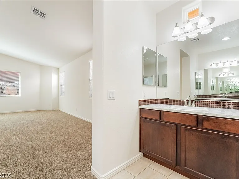 9835 High Alpine St — Photo 30
