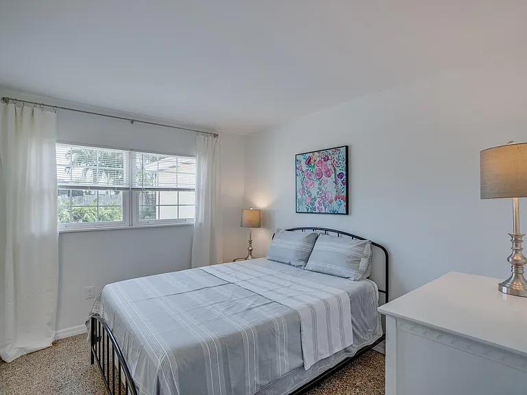 Furnished bedroom #2 with access to completely remodeled Jack & Jill bath