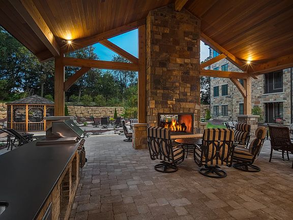 Outside of Club House Retreat with Grill and Fireplace