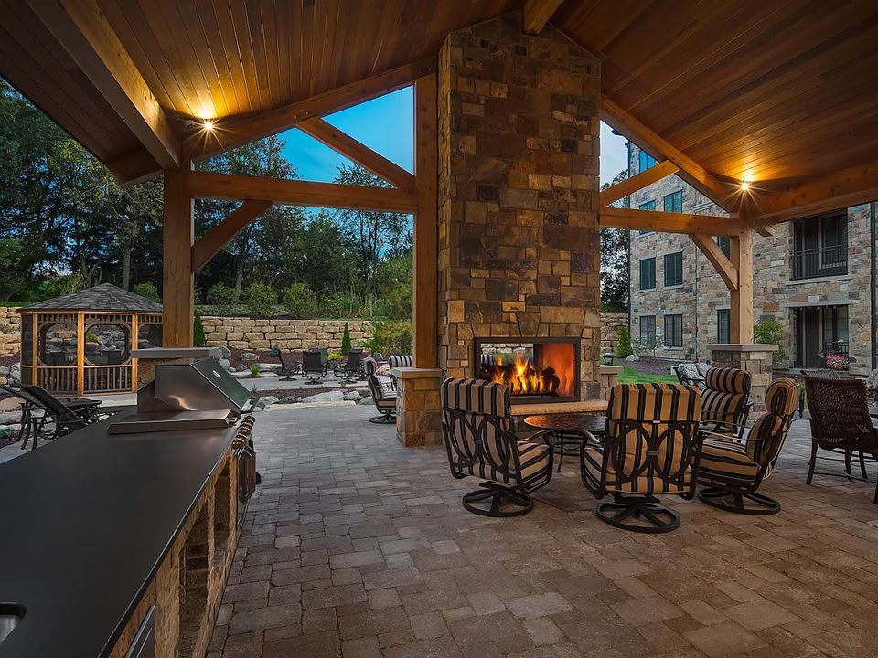 Outside of Club House Retreat with Grill and Fireplace