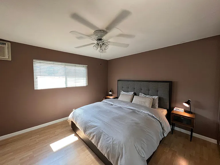 Please note: Pre-renovation photo shown for layout reference. Brand-new flooring has since been installed.