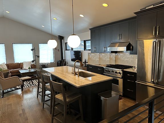 Kitchen next to living room