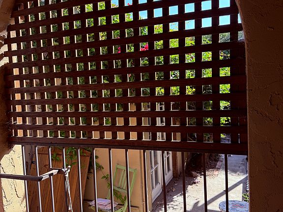 View of backyard and gazebo.