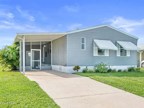 1039 Royal Palm Dr, Barefoot Bay, FL 32976
