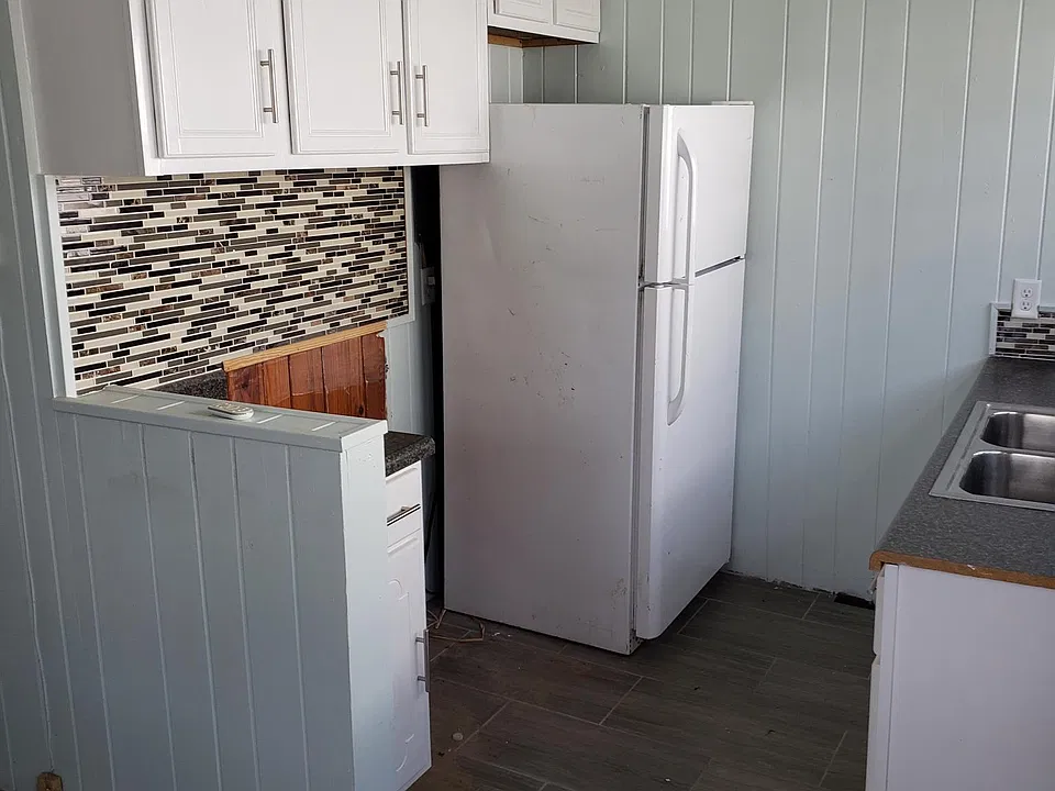 fairly small kitchn with stove not shown