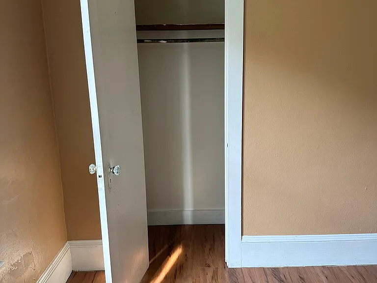 Back bedroom looking at closet.