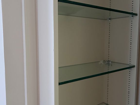 Shelves in the front bedroom