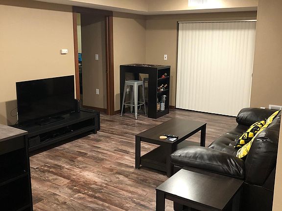 Living room with deck through sliding glass door