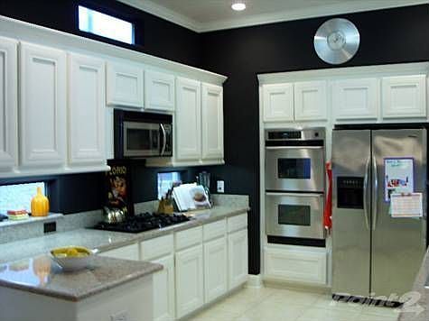 Great kitchen with granite countertops + stainless appliances