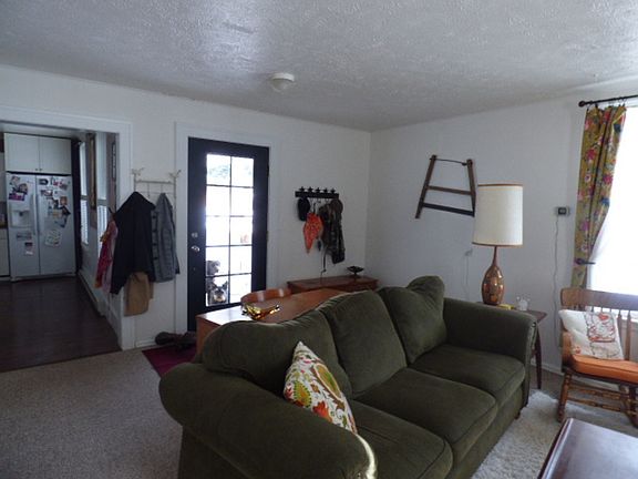 Updated front door and windows add great light.