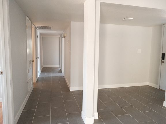 Front entrance and hallway leading to bedrooms