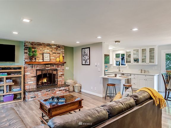 Quintessential open floor plan connects the Family Room to the Dining Room and Kitchen excellent for entertaining.