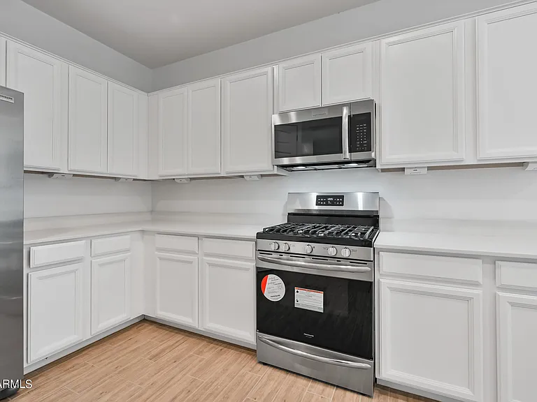 12617 W Kaler Dr — Photo 11