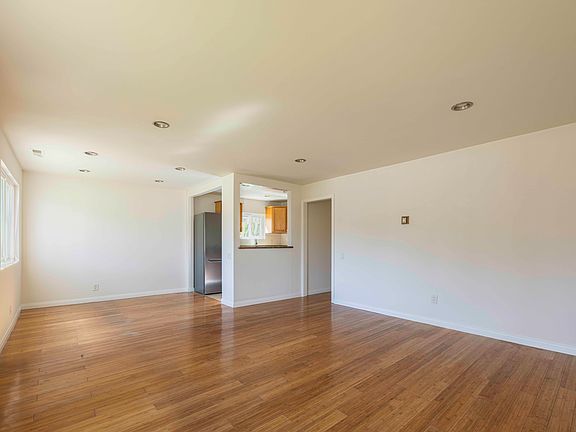 Living and Dining Rooms next to Kitchen